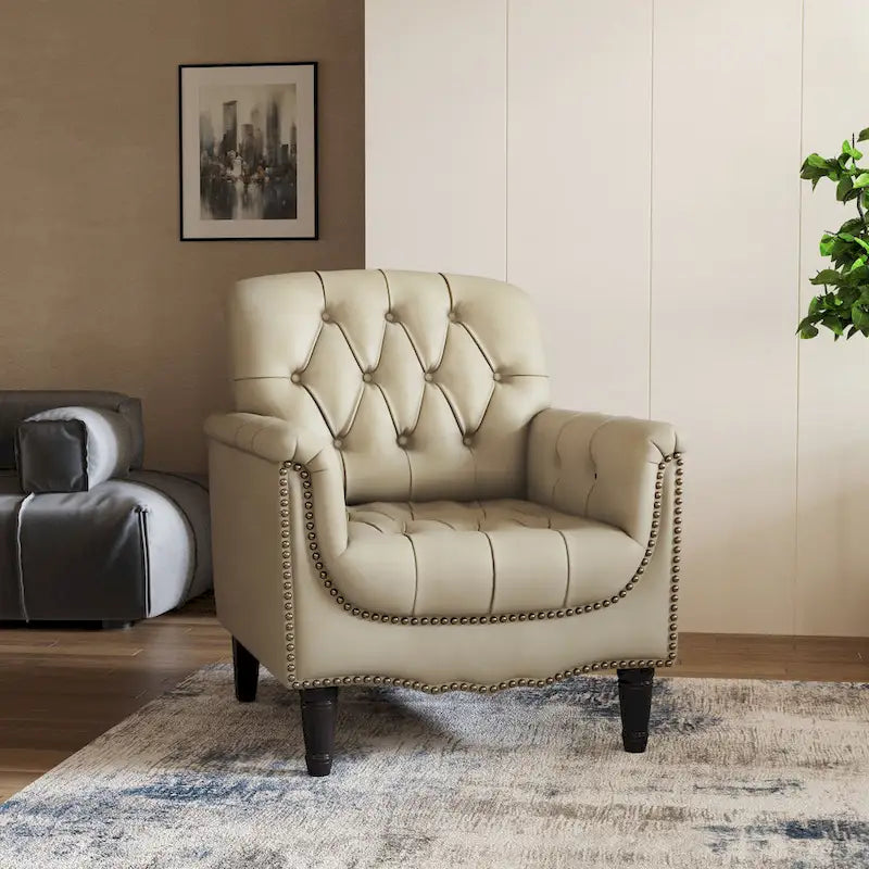 Fauteuil d'appoint capitonné en similicuir avec accoudoirs cloutés