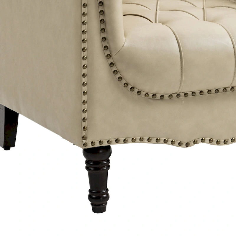 Fauteuil d'appoint capitonné en similicuir avec accoudoirs cloutés