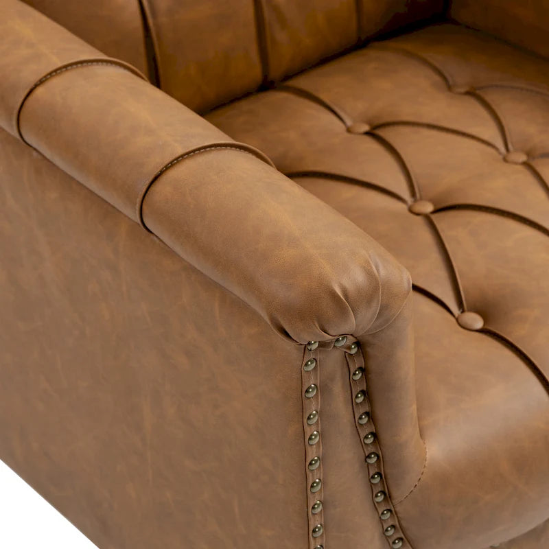 Fauteuil d'appoint capitonné en similicuir avec accoudoirs cloutés